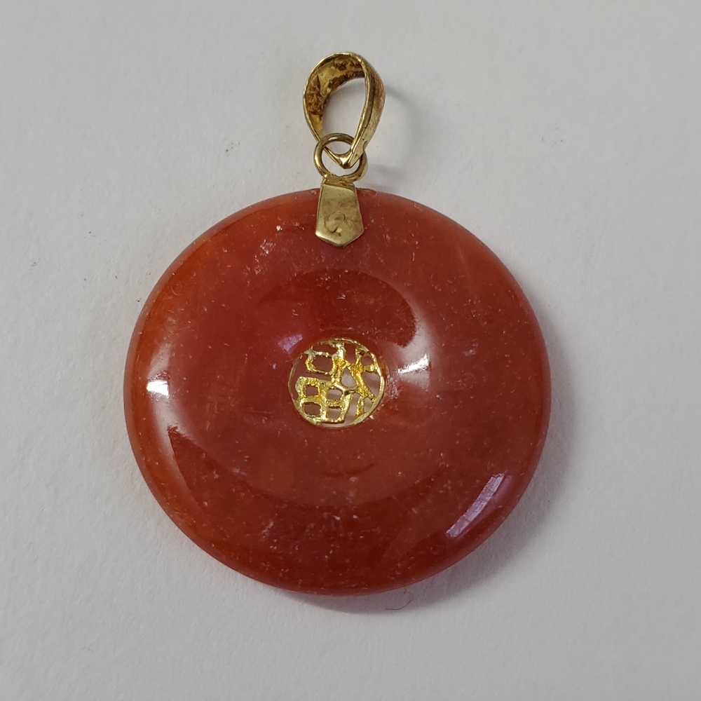 14K Gold Red Jade Pendant – A Striking Symbol of Elegance and Energy